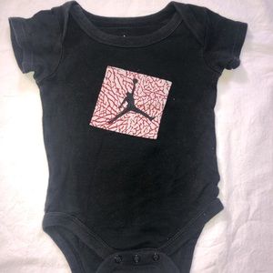 Jordan’s short sleeve baby bodysuit